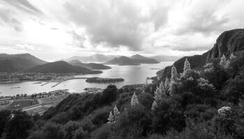 Grayscale Panoramic Lake and Mountain Landscape photo