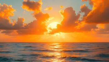 Sunset over the ocean with clouds and water photo