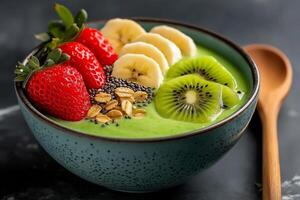 colorful and vibrant smoothie bowl featuring strawberries, bananas, kiwi, and chia seeds, topped with oats, perfect for healthy breakfast or snack photo