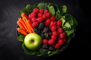 Fresh fruits and vegetables including raspberries, blackberries, spinach, carrots, and green apple arranged in bowl, showcasing vibrant colors and healthy options photo