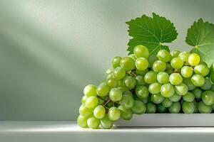 Fresh green grapes with leaves on light background, showcasing their vibrant color and natural shine. Perfect for healthy eating and culinary uses photo