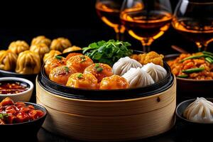 round table featuring variety of Chinese dim sum dishes, including dumplings, buns, and sauces, beautifully arranged with drinks in background photo