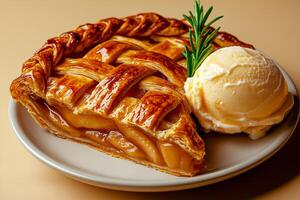 delicious apple pie with golden crust, served with scoop of creamy vanilla ice cream and sprig of rosemary for garnish. This dessert is perfect for any occasion photo