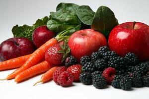 Fresh fruits and vegetables including apples, carrots, spinach, strawberries, and blackberries create vibrant and healthy display. This colorful arrangement showcases nature bounty photo
