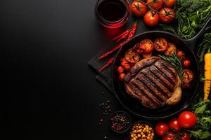 Delicious medium rare steak served in cast iron skillet, surrounded by fresh vegetables, herbs, and spices, creating vibrant and appetizing scene photo