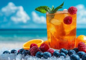 Colorful summer cocktail with blueberries and raspberries, garnished with mint, set against beach backdrop. Refreshing drink perfect for warm days photo
