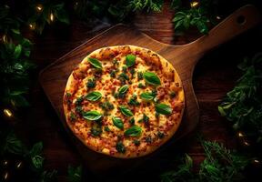 Delicious pizza topped with cheese, basil, and tomato sauce on wooden board, surrounded by greenery, creating warm and inviting atmosphere photo