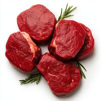 Fresh raw beef steaks with herbs on white background showcasing rich red color and texture Perfect for culinary presentation and recipe photo