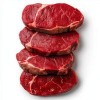 Fresh raw beef steaks stacked neatly, showcasing rich red color and marbling. Ideal for culinary presentations or meat related content photo