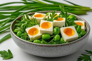 Fresh salad with feta cheese and egg yolks on bed of greens, garnished with herbs. vibrant and healthy dish perfect for light meal or appetizer photo