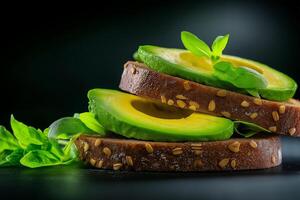 Fresh avocado slices on whole grain bread with basil leaves photo