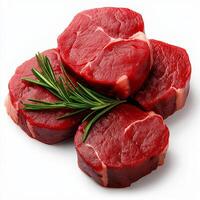 Fresh raw beef steaks arranged with sprig of rosemary, showcasing rich red color and marbling. Perfect for culinary presentations and meat dishes photo