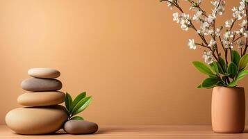 Serene still life featuring stacked stones and vase with flowers against beige background, evoking tranquility and balance photo