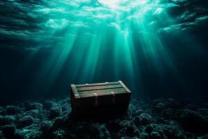 treasure chest rests on ocean floor, illuminated by beams of sunlight filtering through water. serene underwater scene evokes sense of mystery and adventure photo