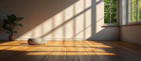 minimalist interior of empty room with natural light, wooden floor, and plant. shadows create serene atmosphere, enhancing peaceful ambiance photo