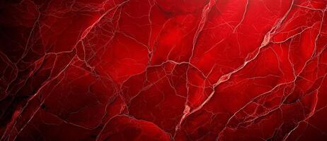 Red stone texture with cracks, resembling vibrant marble background. This striking surface showcases intricate patterns and deep hues, perfect for various design applications photo