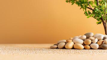 serene arrangement of smooth pebbles on beige background, complemented by small green plant, creates calming atmosphere photo