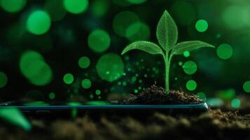 green seedling growing from soil on smartphone, symbolizing technology and nature. vibrant colors and glowing elements create sense of innovation and growth photo