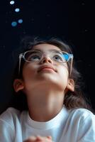A child wearing glasses gazes upward with wonder at the night sky, discovering hidden galaxies and nebulous clouds that create a magical atmosphere filled with starlight photo