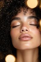Healthy, defined natural curls are being hydrated with a nourishing mist while the soft-focus background features warm golden bokeh, creating a radiant beauty aesthetic photo