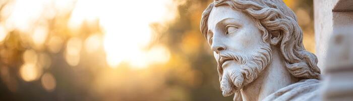 A beautifully sculpted statue of Jesus stands illuminated by soft sunlight filtering through trees. A warm, divine glow highlights his serene expression, creating a cinematic, spiritual scene photo