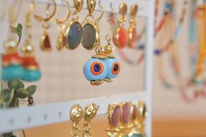 Unique handmade earrings displayed at a local craft fair photo