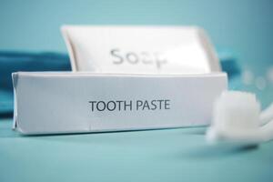 Toothpaste and toothbrush are arranged for a morning hygiene routine photo