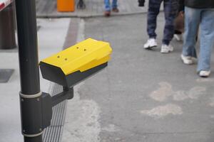 Security system monitoring pedestrian area in urban setting photo