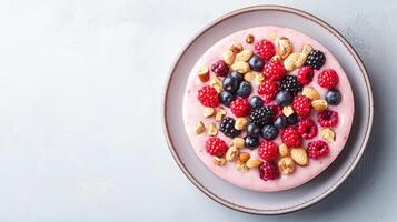 Plant-based ethics concept. A vibrant dessert topped with assorted berries and nuts, served on a light plate, showcasing a delicious blend of colors and textures. photo