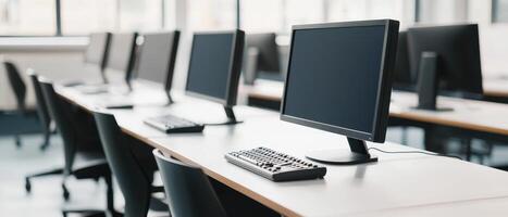 Higher education with students and policy concept. Modern office space featuring rows of computers on desks in a well-lit environment. photo
