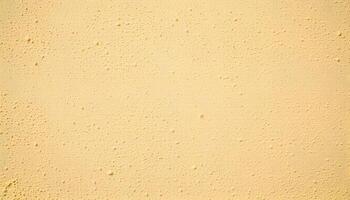 Textured stucco background in pale yellow with fine lines and subtle color variations photo