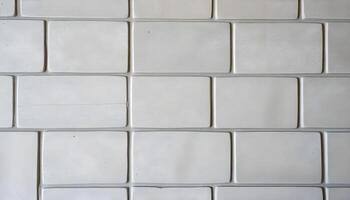 Smooth concrete block texture with soft shadows, photo