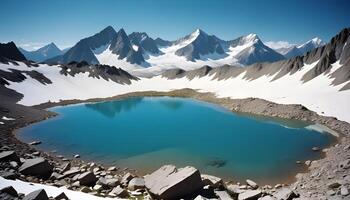 Remote mountain range with sharp snowy peaks mirrored in a still alpine lake under clear sky photo