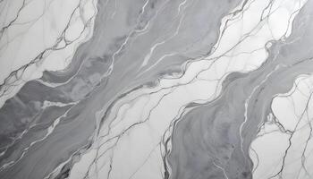 Elegant gray marble texture with distinct veining in white, showcasing a smooth and polished surface photo