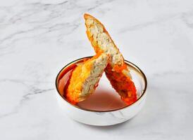 Crispy Tempeh fritters served in plate isolated on marble background side view of singapore food photo