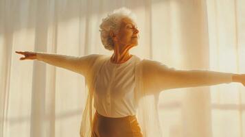 Elderly Woman Stretching Arms Gracefully in Soft Natural Light photo