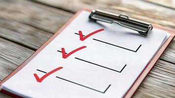 Checklist on clipboard on wooden table photo