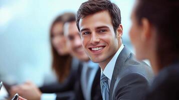 Smiling Group of Business Professionals in a Meeting Environment photo