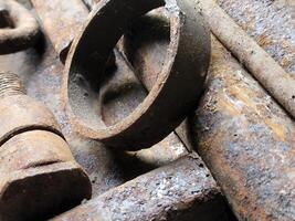 Rusty parts. Rusty spare parts background. Vintage background. photo