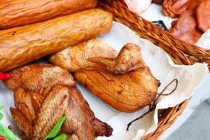 Experience the delightful Smoked Meats and Charcuterie Display at the Local Market today photo
