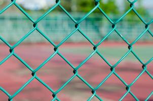 Wire Net Beside Sports Field for Background Used photo