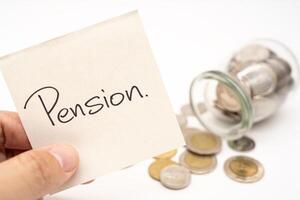 Pension Text on paper note with Thai Baht Coins spilled out of jar glass background, saving for future, Investment business concept. photo