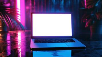 A laptop with a neon light on it photo