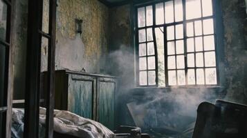 An old room with smoke coming out of the window photo
