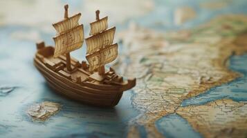 A model ship on a vintage map, symbolizing exploration and adventure. photo
