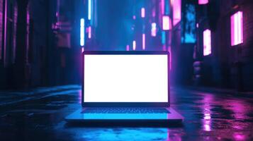 Laptop on a dark street with neon lights photo