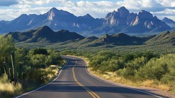 Winding Road with Breathtaking Mountain Views on the Horizon photo