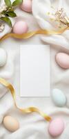 Minimalistic Easter greeting card design with pastel eggs and floral accents photo