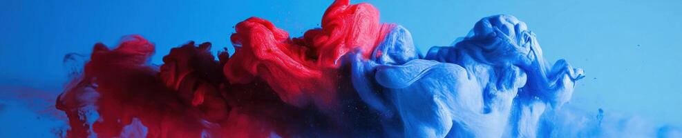 Energetic burst of red and blue paint mixing in dynamic motion photo