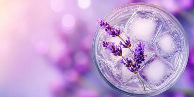 Luxurious lavender lemonade with ice cubes in elegant glass for refreshing summer drink photo